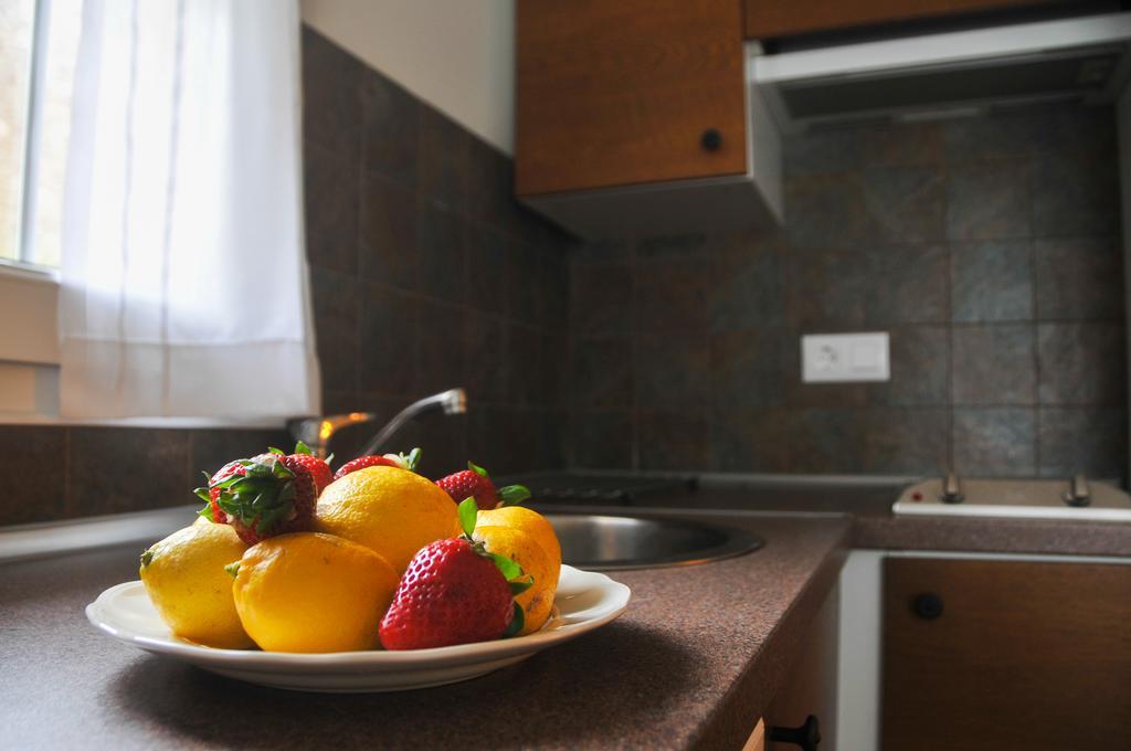 Apartamentos Corona Комильяс Экстерьер фото